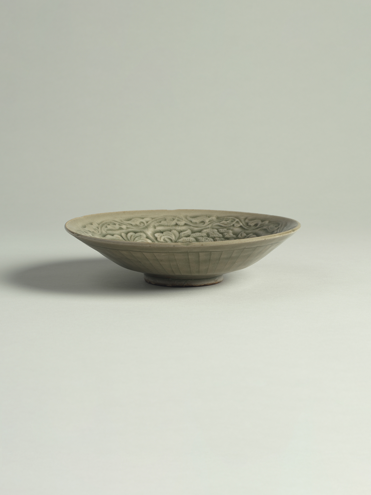 4. Green-glazed stoneware dish