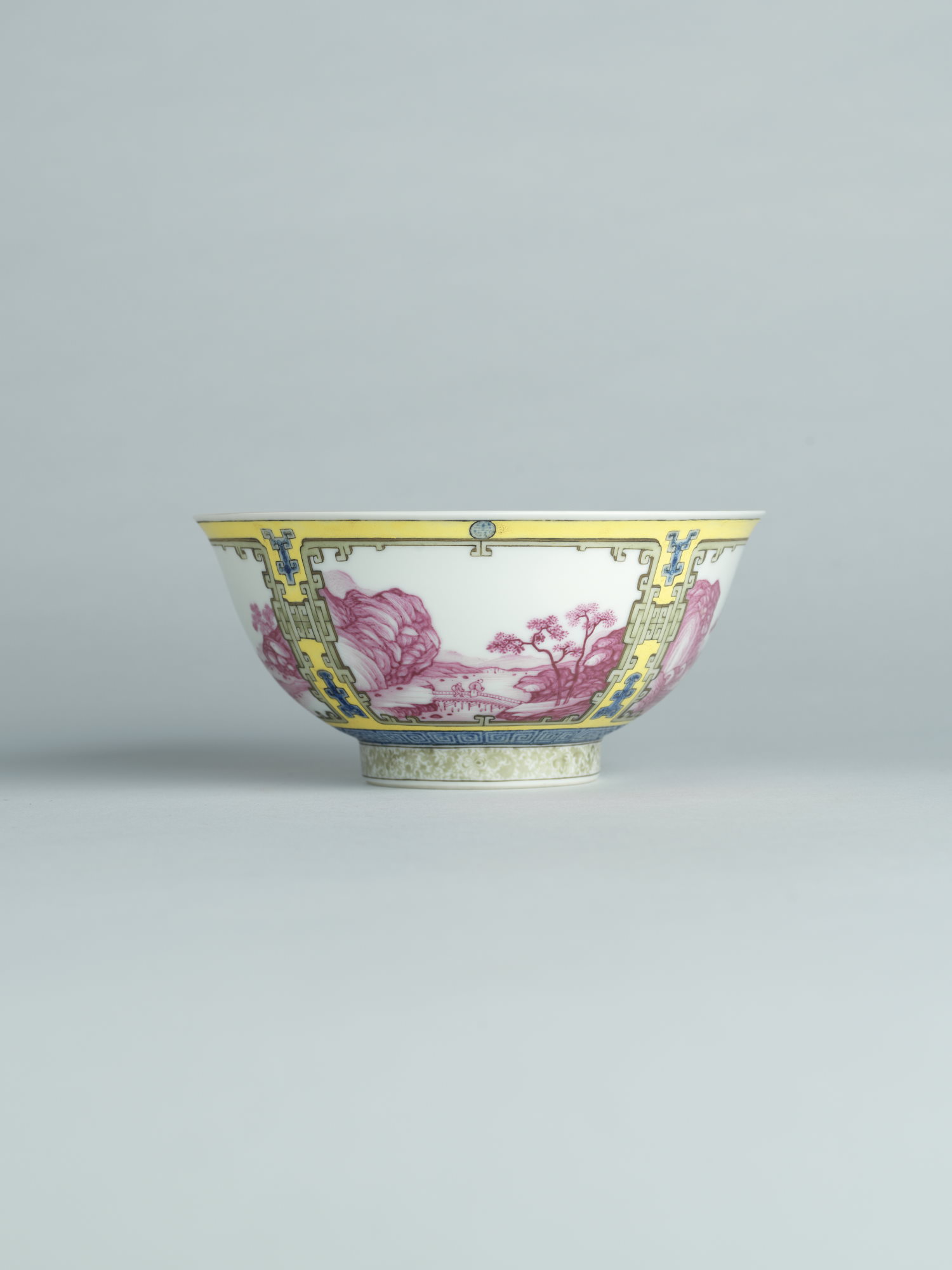 A yellow-ground falangcai porcelain ‘landscape’ bowl