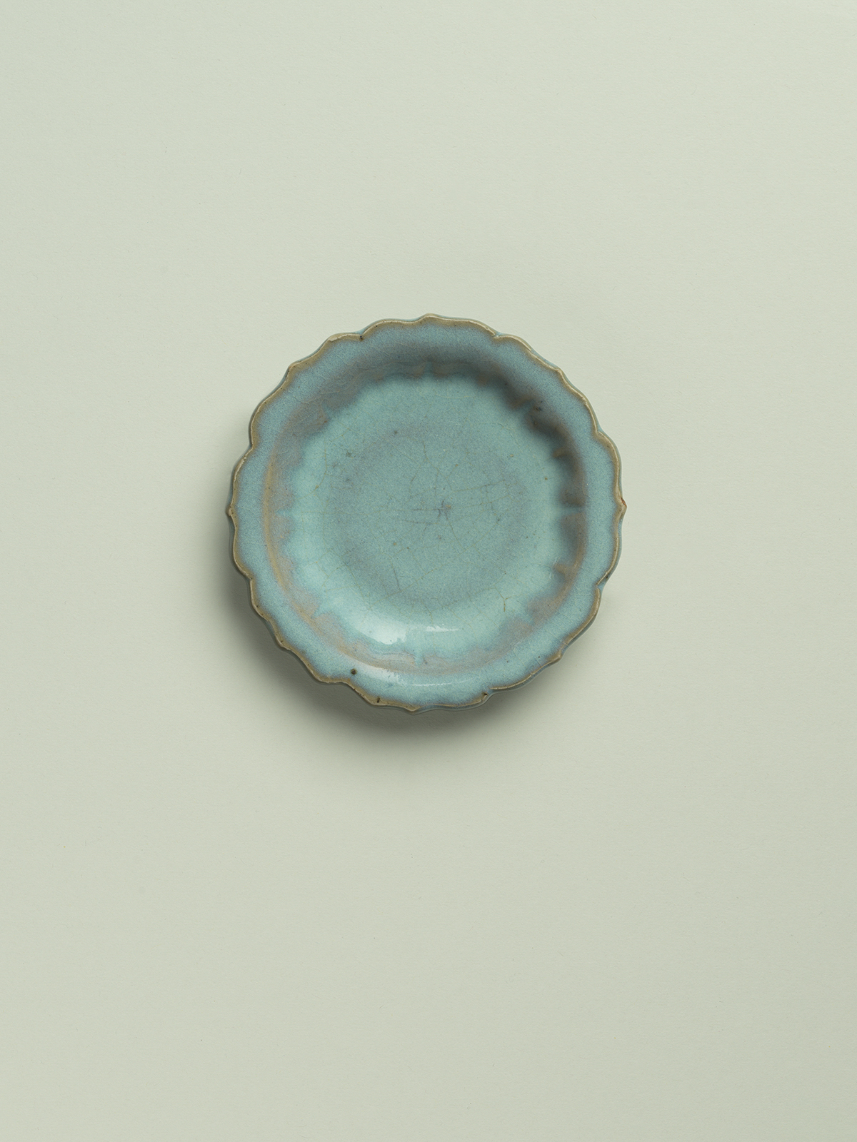 7. Small glazed stoneware octofoil dish