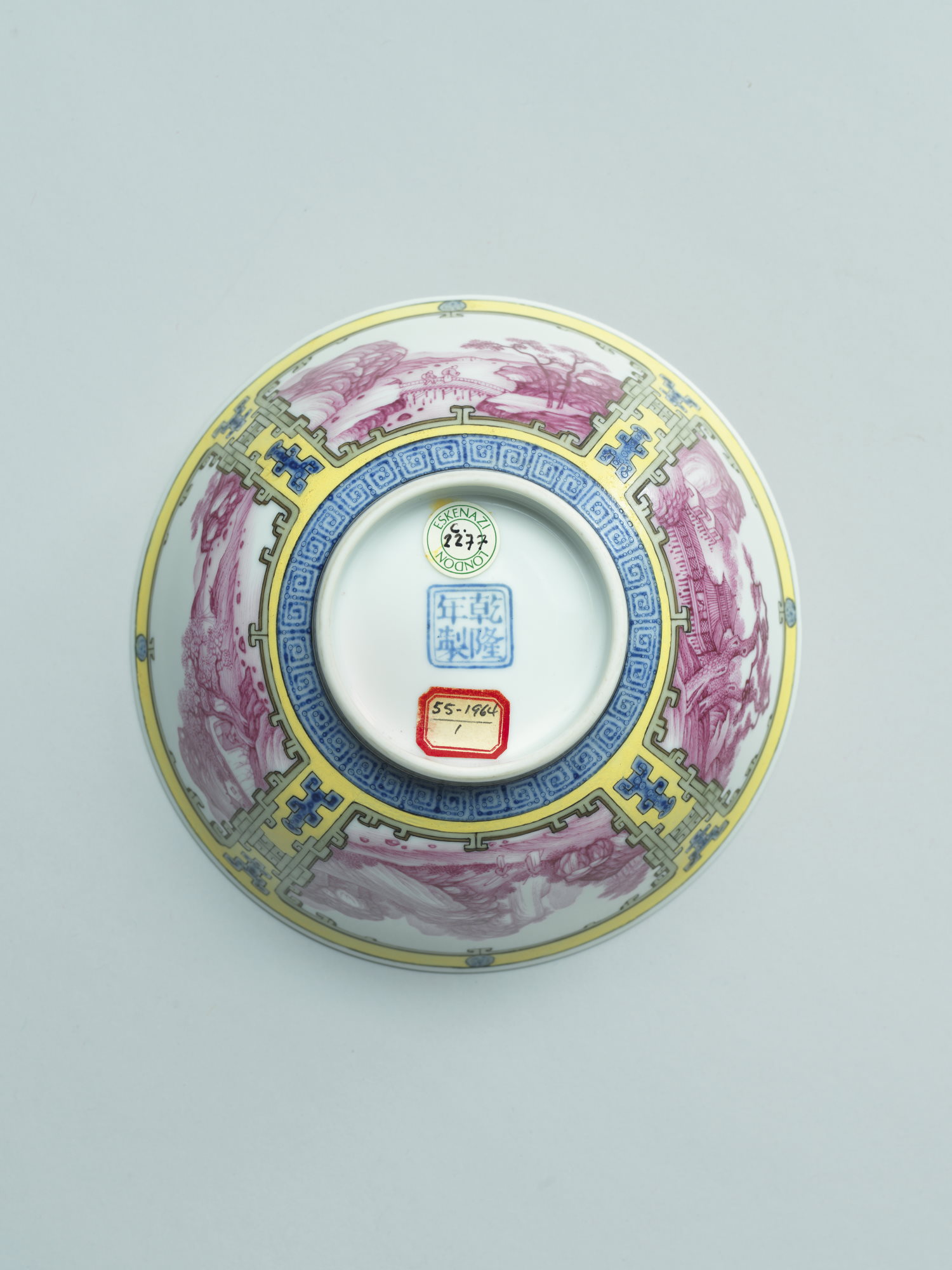 A yellow-ground falangcai porcelain ‘landscape’ bowl