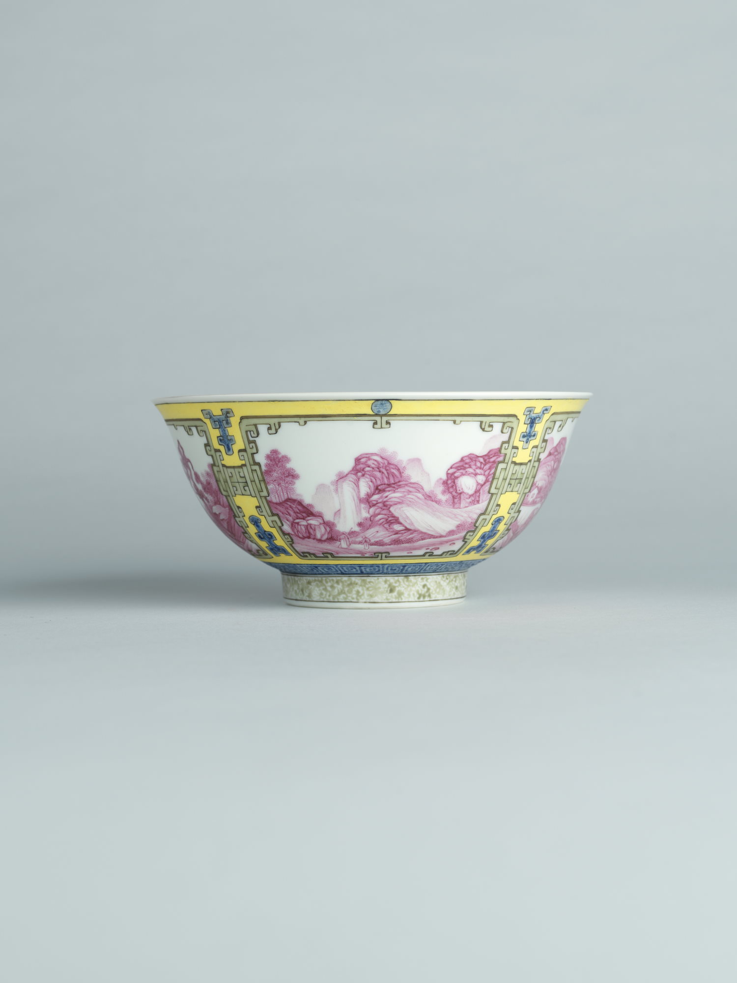 A yellow-ground falangcai porcelain ‘landscape’ bowl