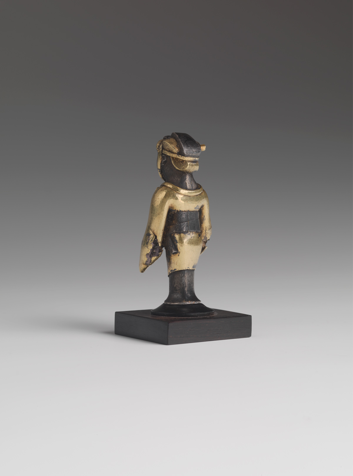 Gold and Silver Standing Figure