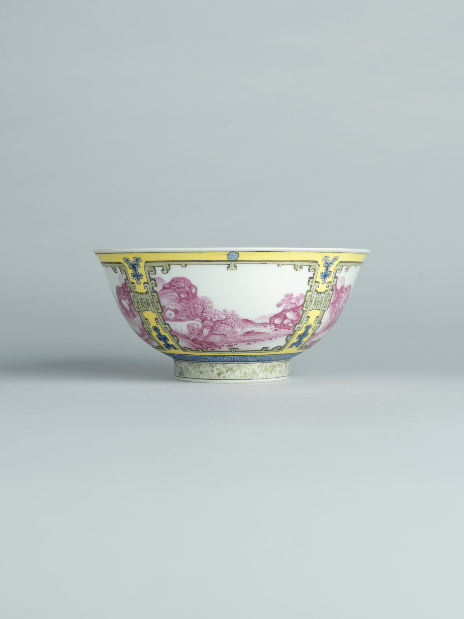 A yellow-ground falangcai porcelain ‘landscape’ bowl