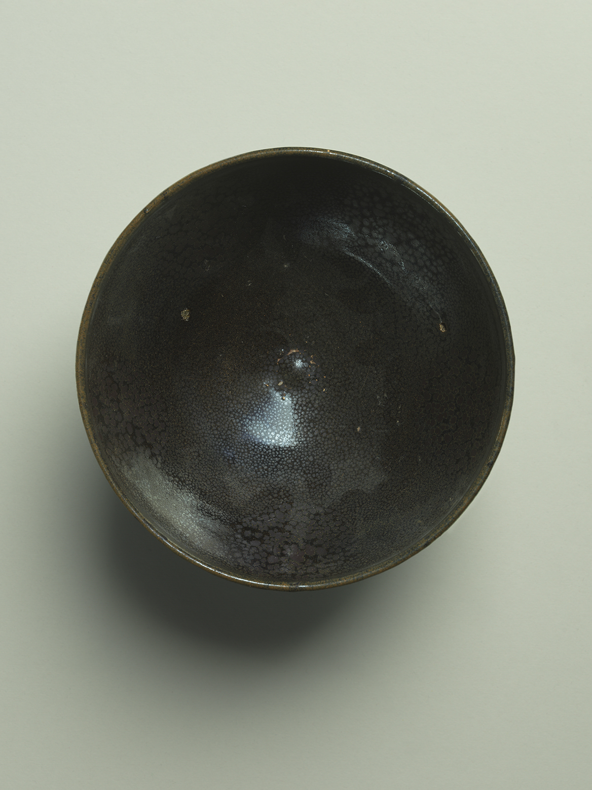 8. Black-glazed stoneware ‘oil-spot’ bowl