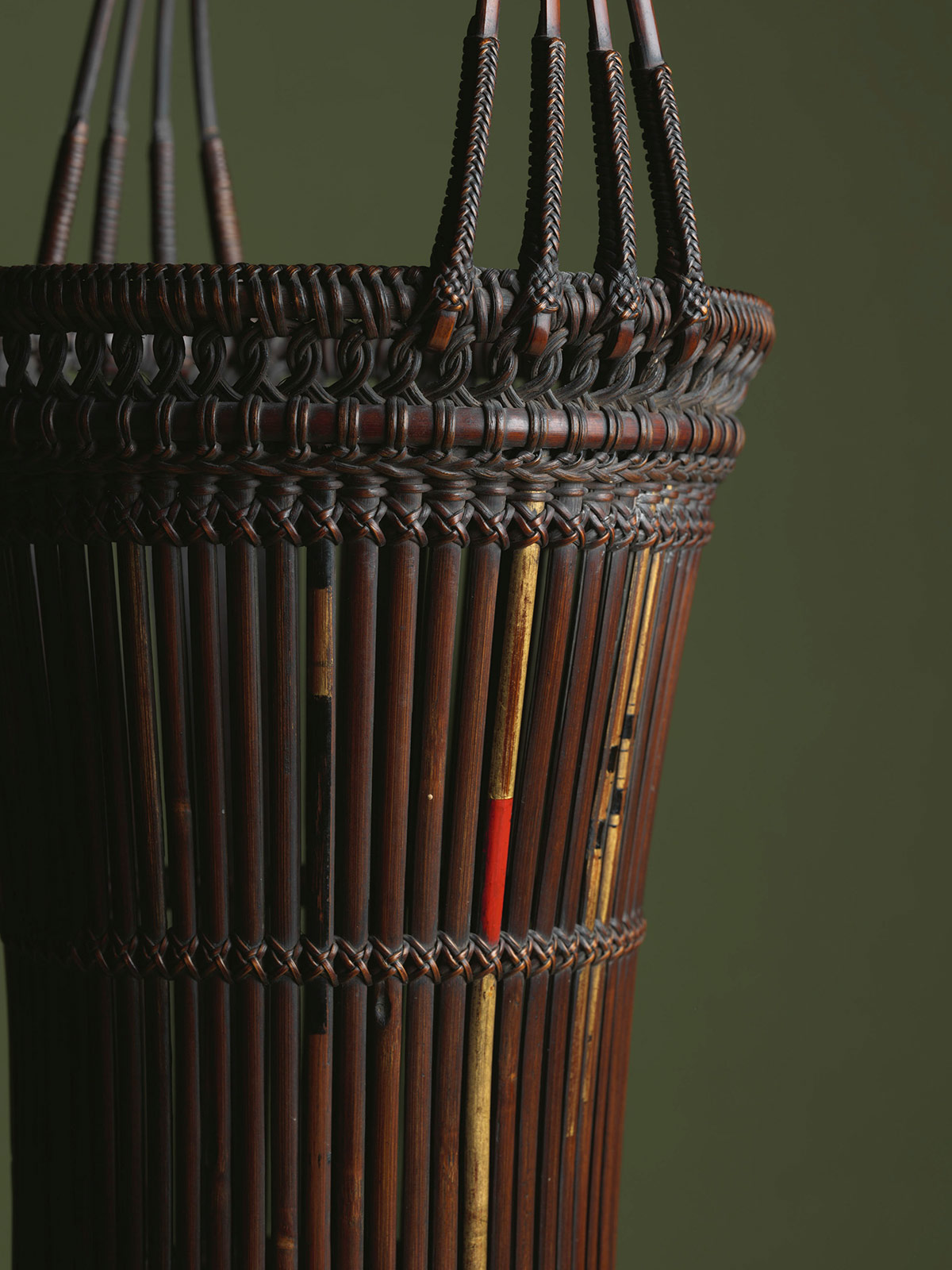 1. Drum-shaped flower basket made from old arrow shafts