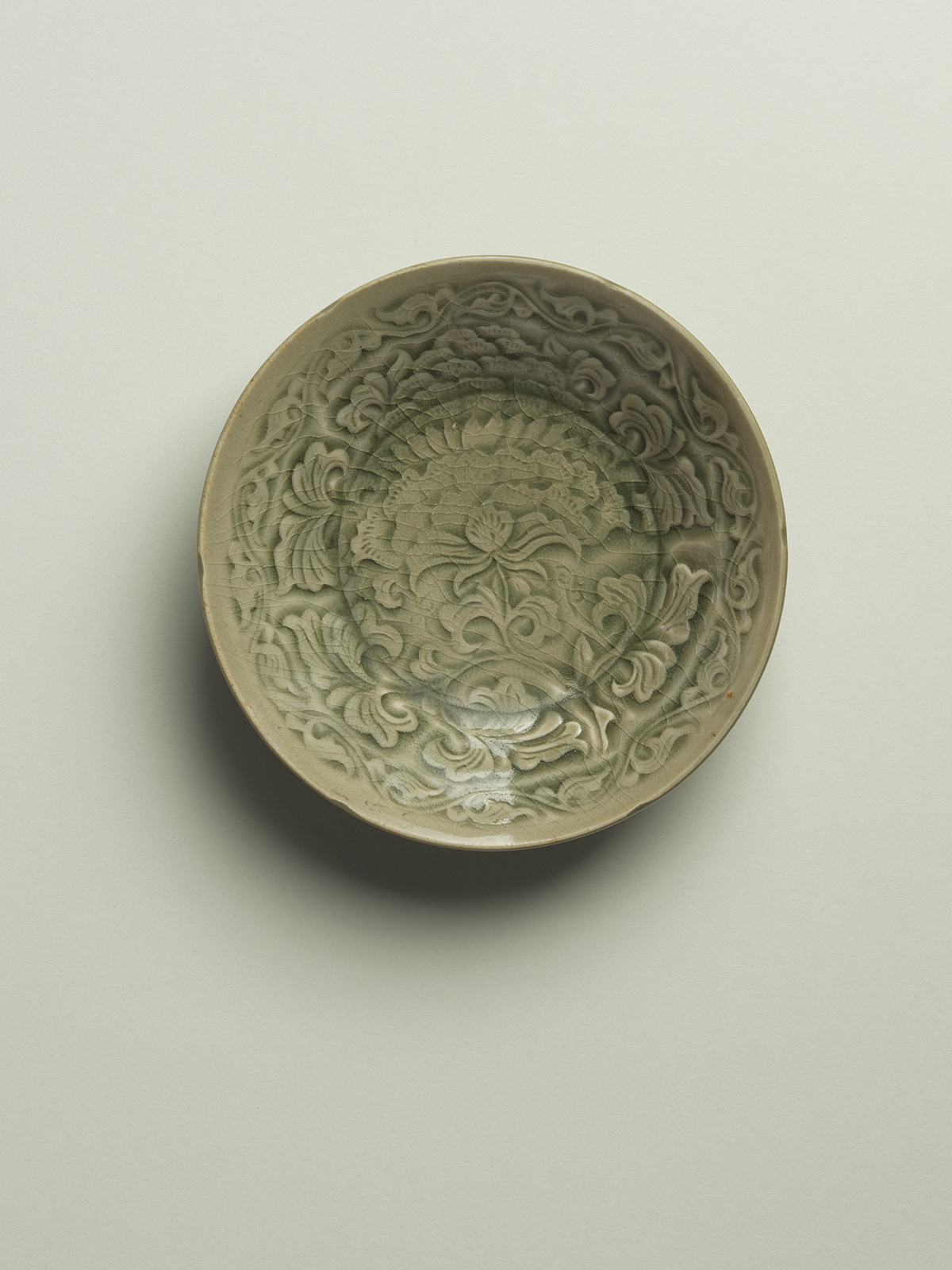 4. Green-glazed stoneware dish