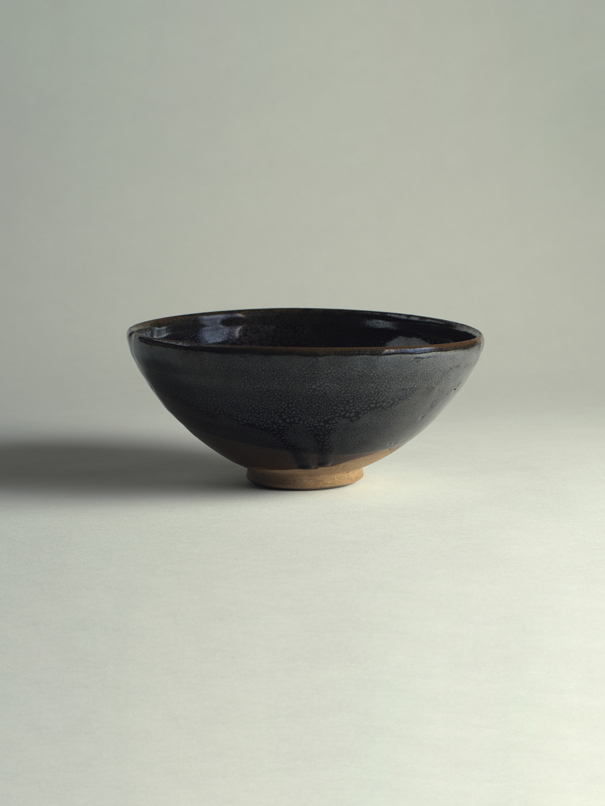 9. Black-glazed stoneware ‘oil-spot’ bowl