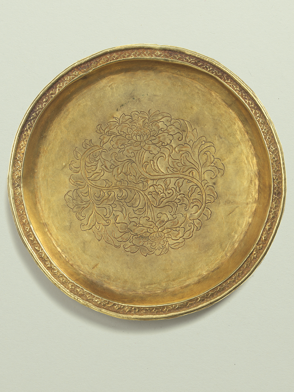 14. Circular gold dish