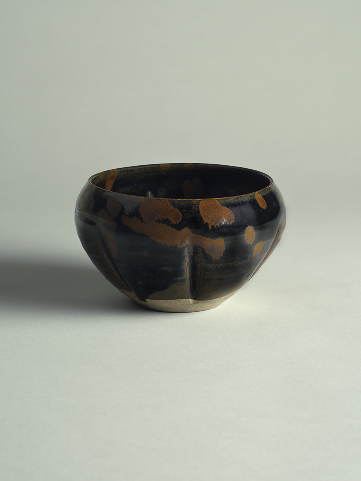 10. Glazed stoneware fluted bowl