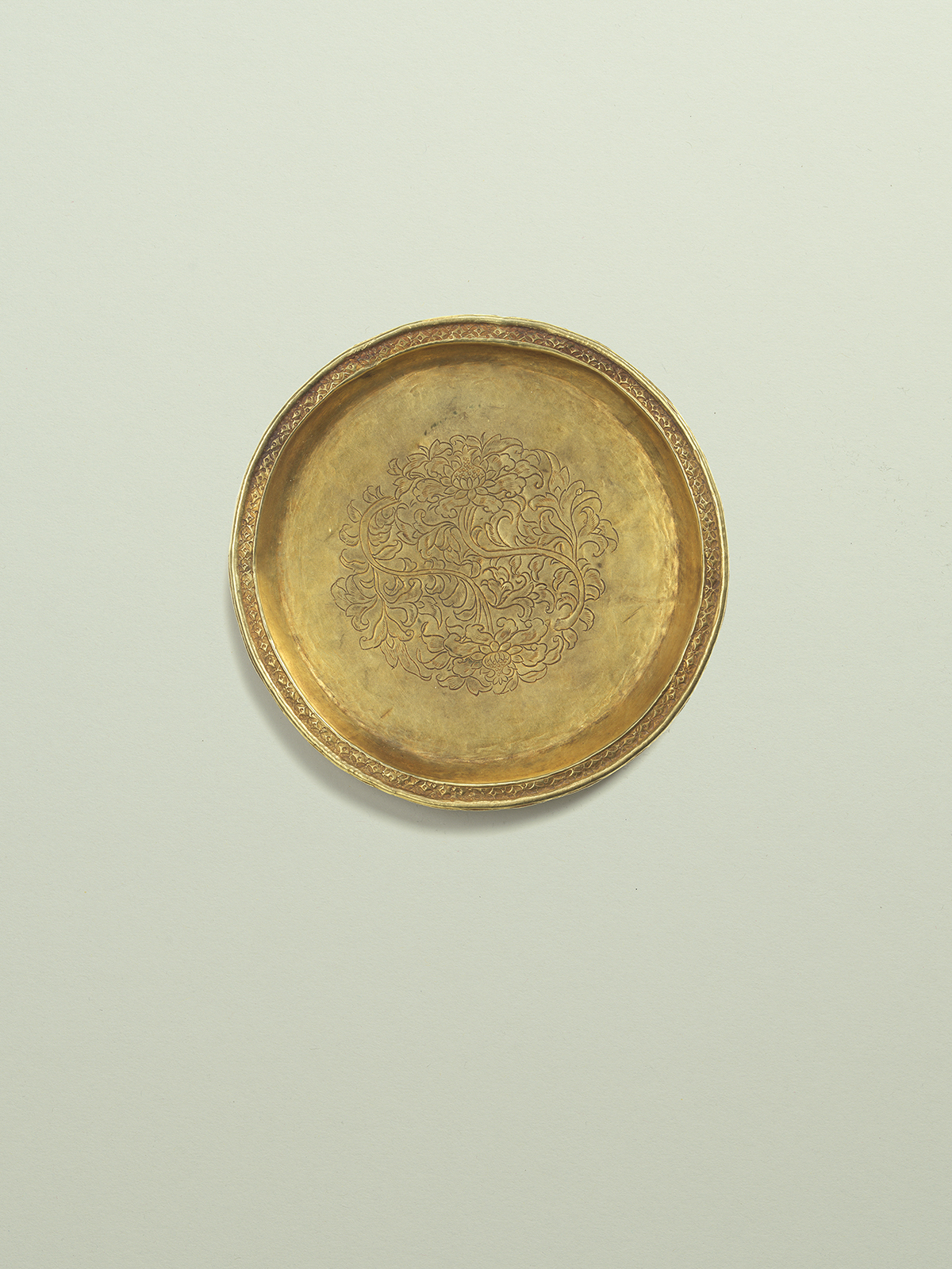 14. Circular gold dish