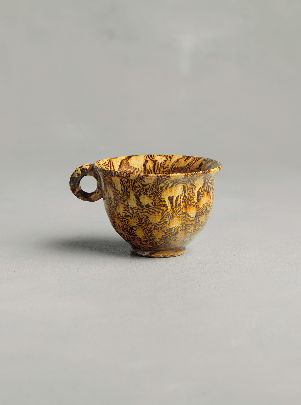 Amber-glazed Marbled Earthenware Cup