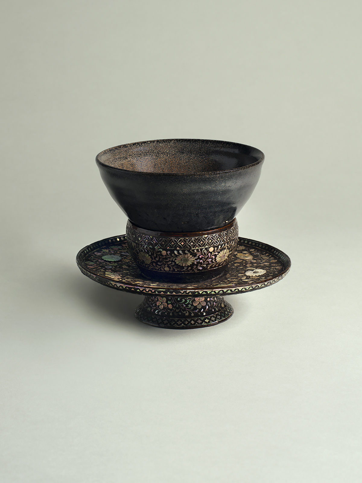 17. Black-grey-glazed haikatsugi stoneware tea bowl and mother-of-pearl inlaid lacquer tea bowl