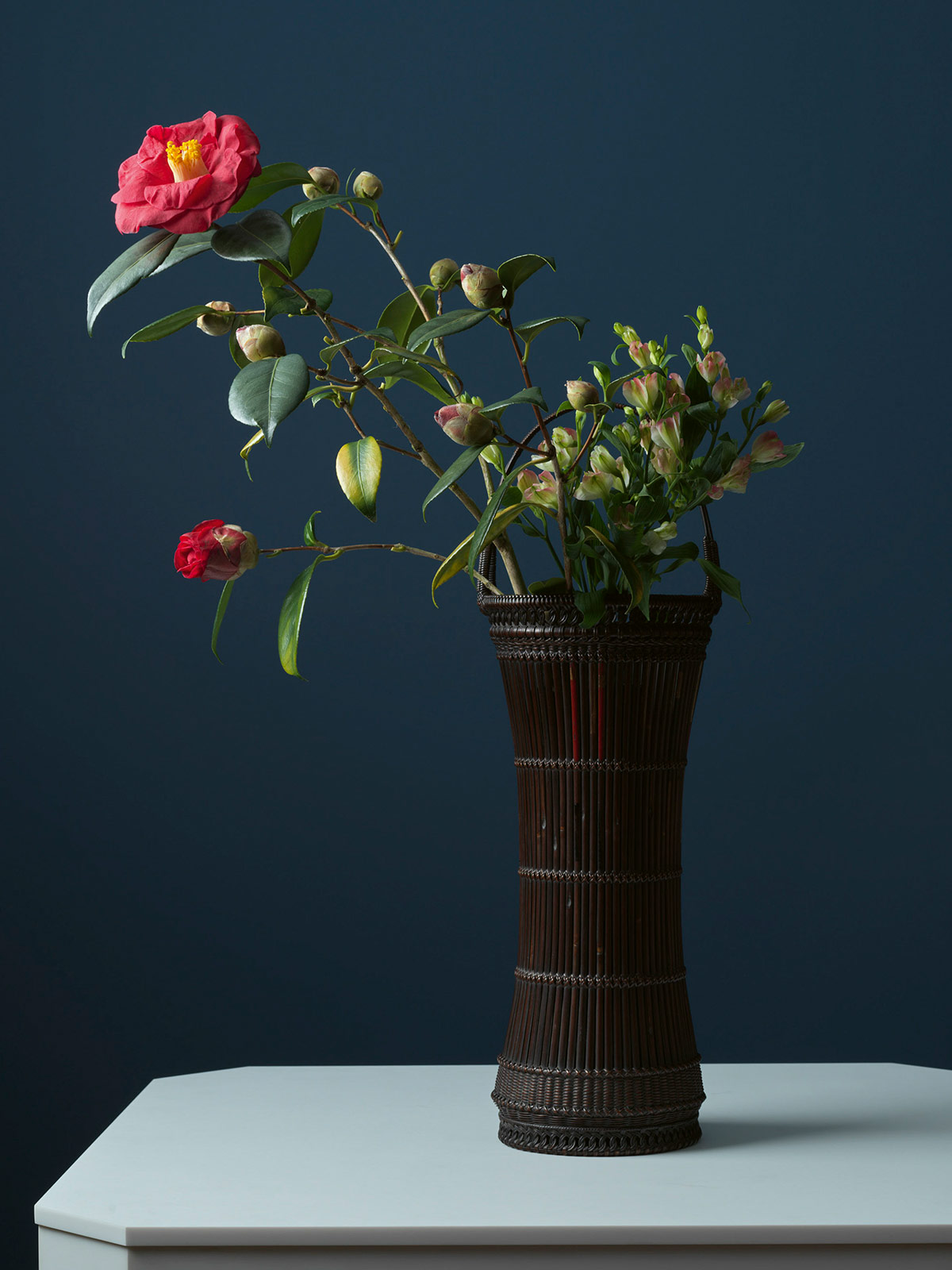 1. Drum-shaped flower basket made from old arrow shafts