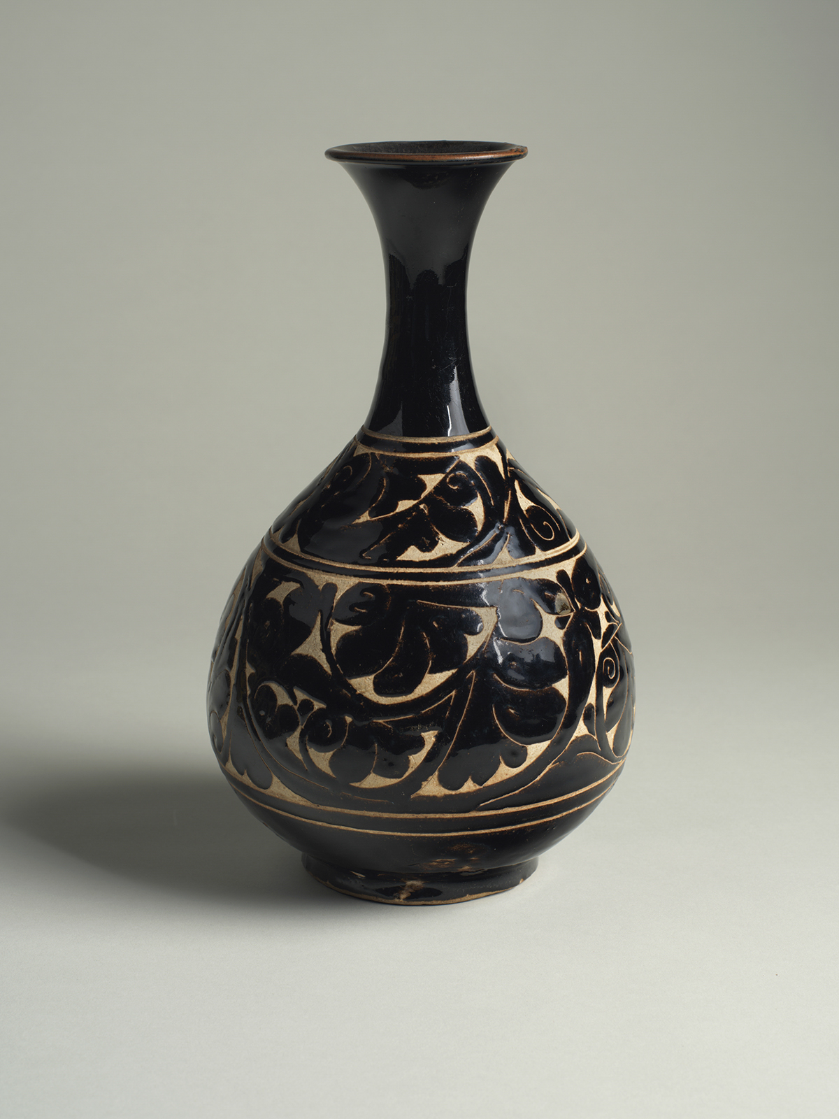 13. Black-glazed stoneware bottle (yuhuchun ping) with ‘cut-glaze’ decoration